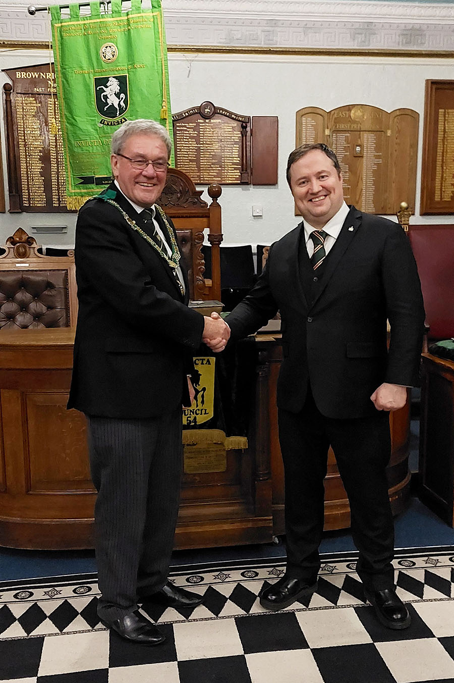 Bro Shame Lawlor being congratulated by the DGP R.W.Bro Brian Ward