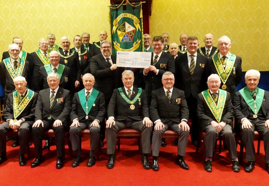 D.G.P. of Northumberberland and Durham and District officers with their guests and Vistitors proudly display a Cheque donated to the  Mark Degree.