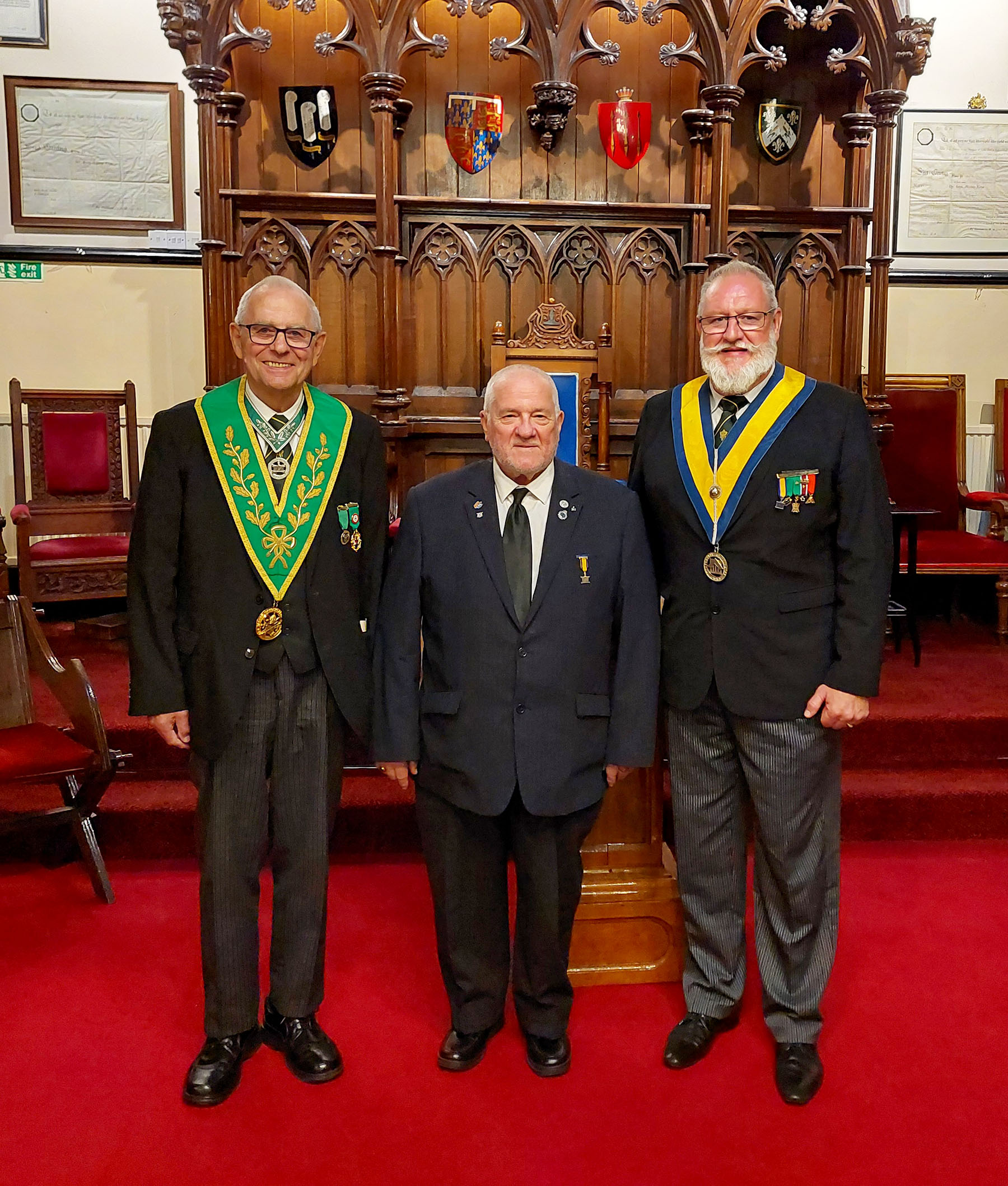 Bro. Neil Drakley flanked by the Worshipfull Master W.Bro. Pierre Ambrody and V.W.Bro. Ralph Apperley