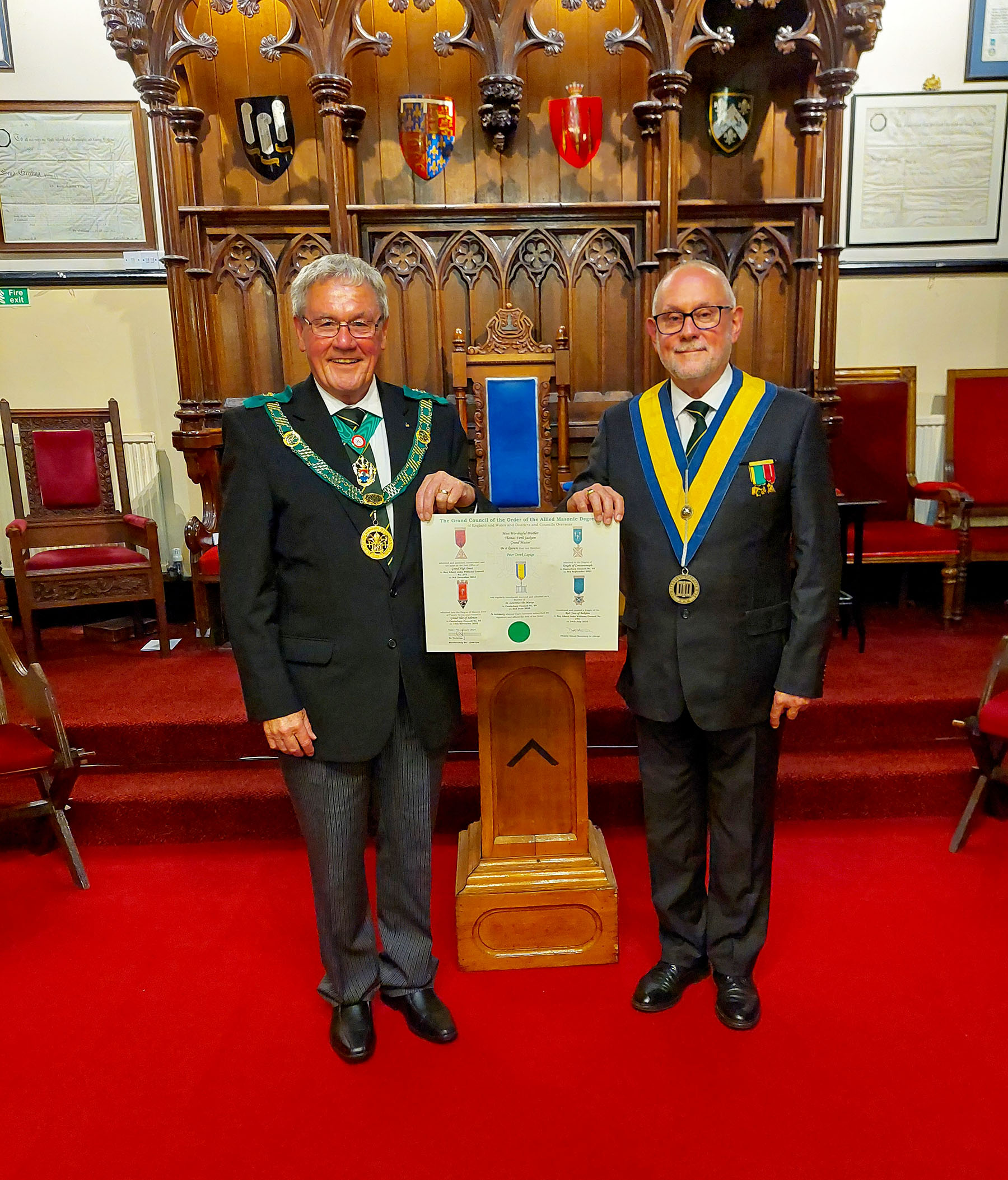 The District Grand Prefect R. W.Bro. Brian Ward presents a Grand Council Certificate to Bro. Peter Lapage