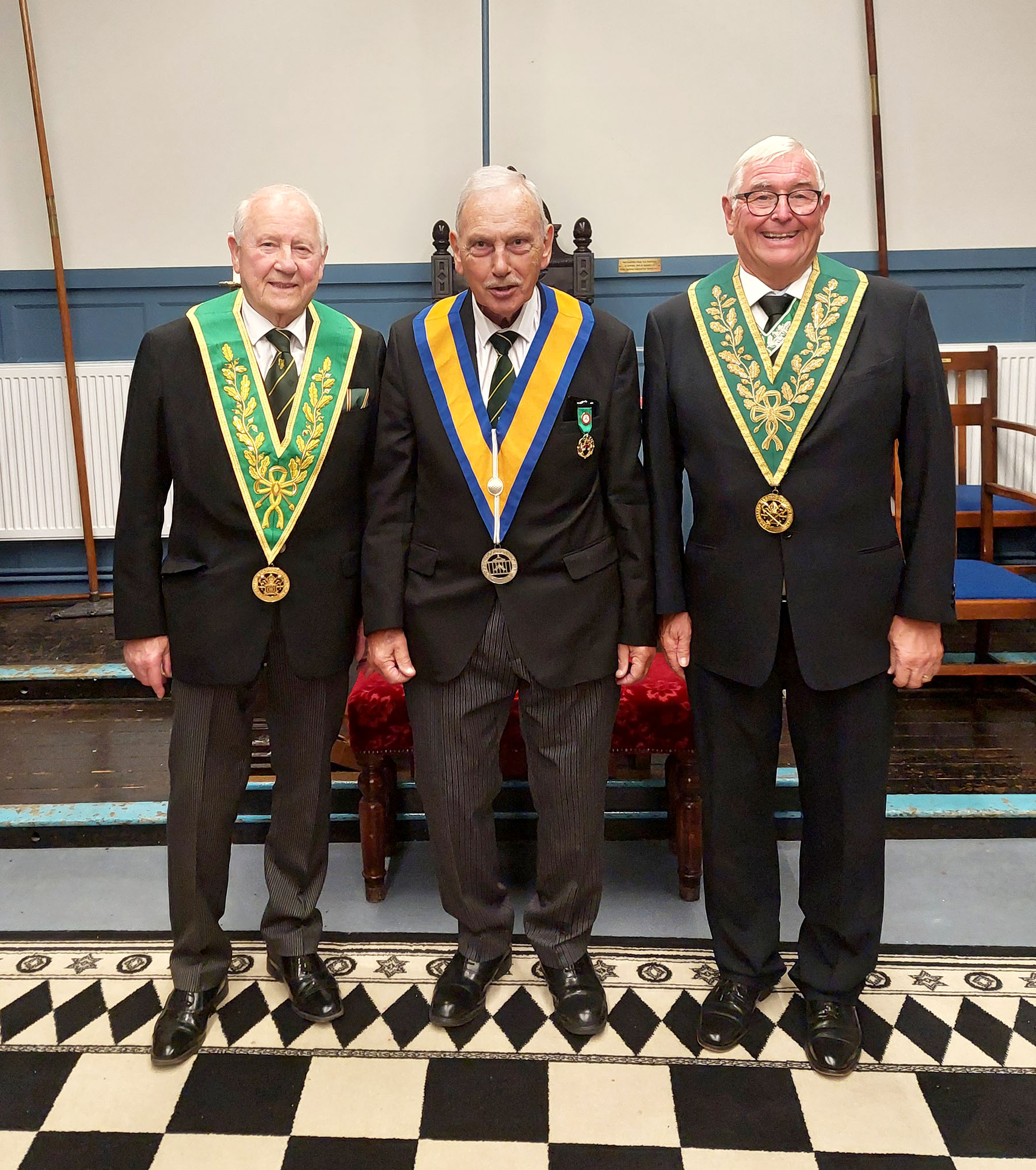 The Worshipfull Master W. Bro. David James with R. W. Bro. David Jordan and W. Bro. Geoff Whale